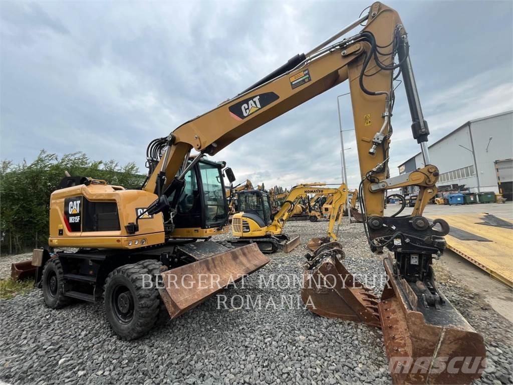 CAT M315F Gumikerekes kotrók