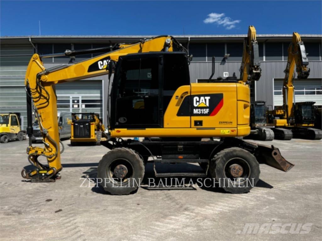 CAT M315F Gumikerekes kotrók
