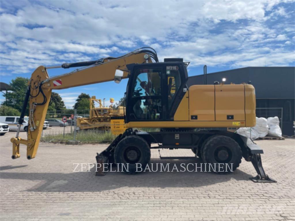 CAT M316-07A Gumikerekes kotrók