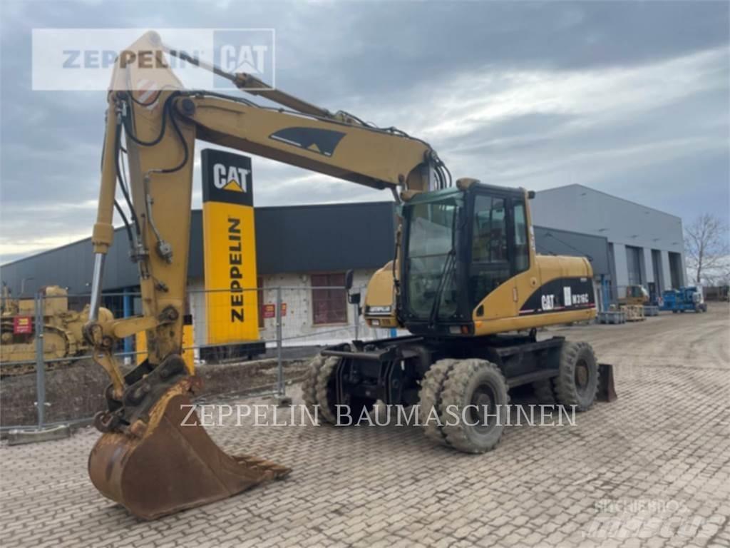 CAT M316C Gumikerekes kotrók