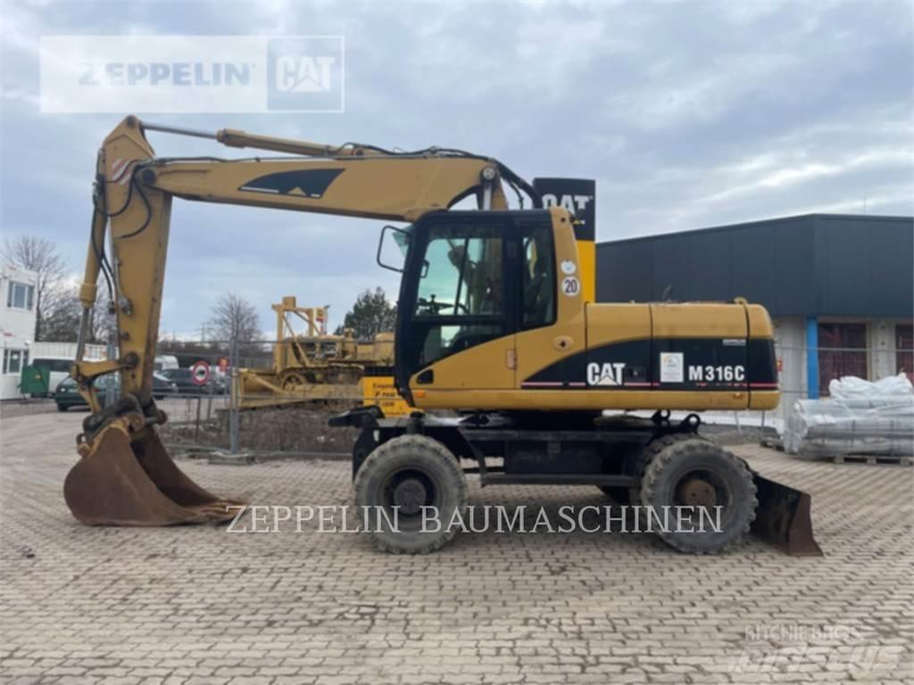 CAT M316C Gumikerekes kotrók