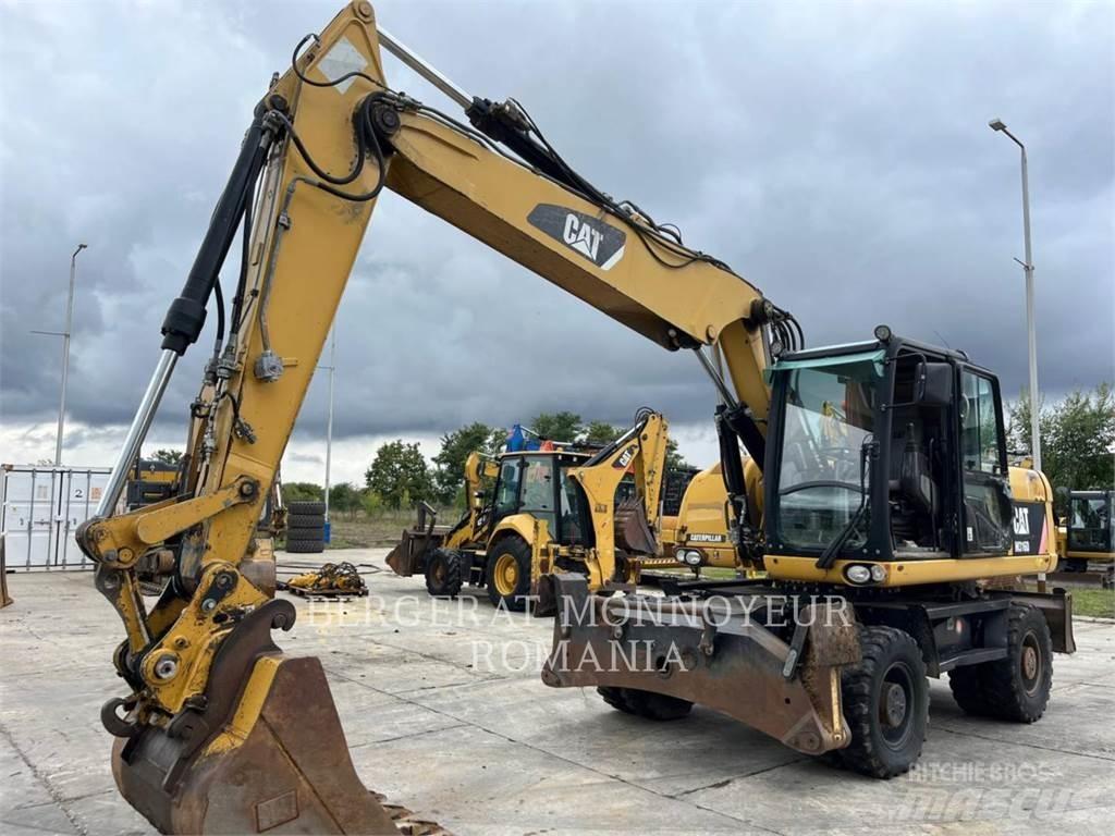CAT M316D Gumikerekes kotrók