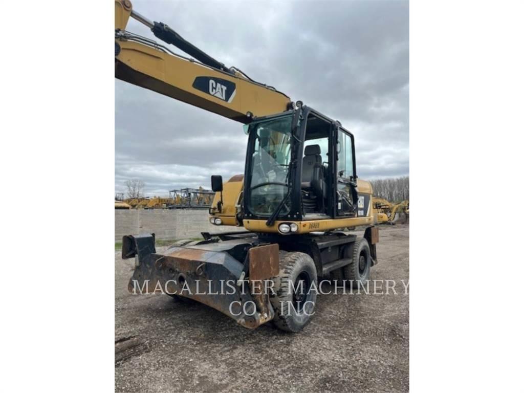 CAT M316D Gumikerekes kotrók