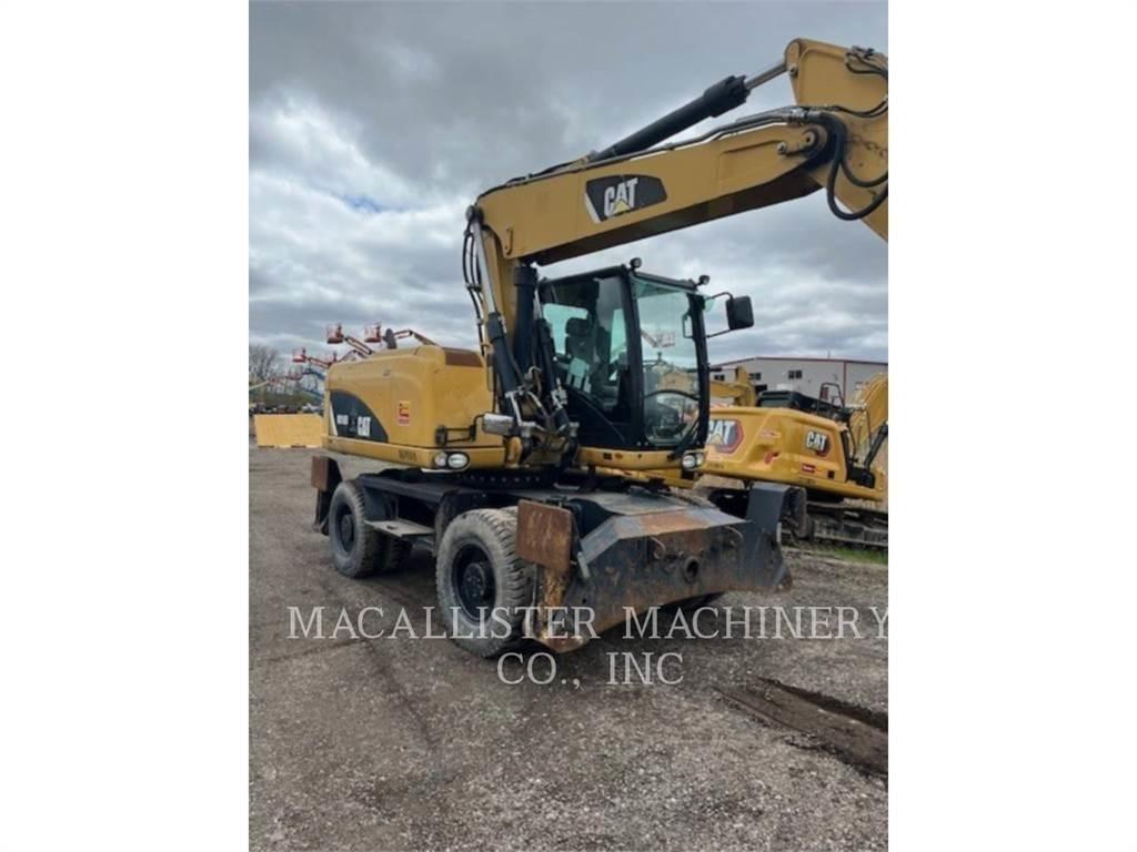 CAT M316D Gumikerekes kotrók