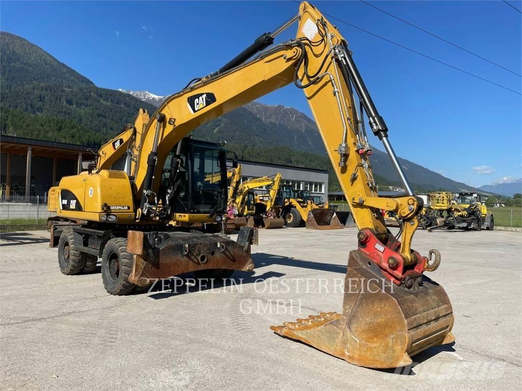 CAT M316D Gumikerekes kotrók