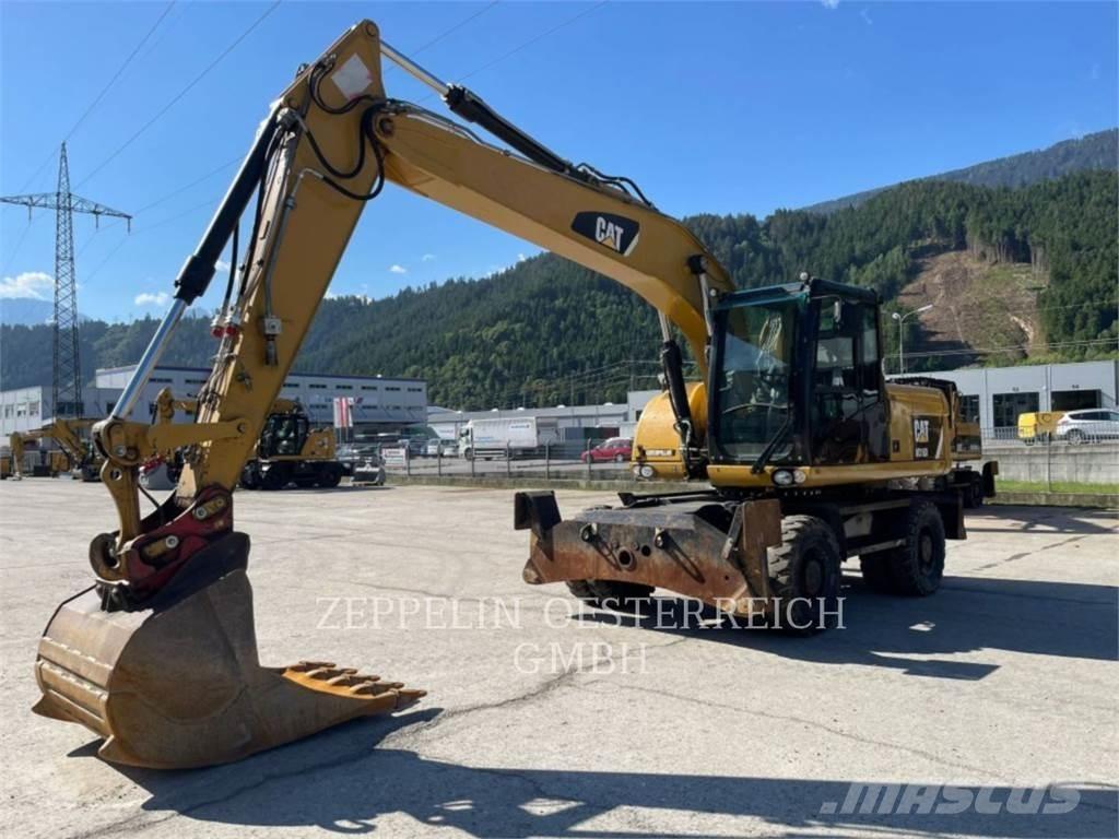 CAT M316D Gumikerekes kotrók