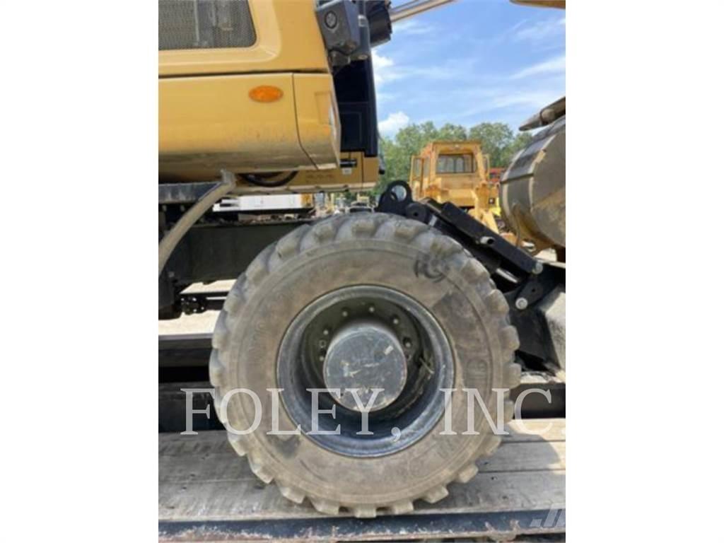CAT M316F Gumikerekes kotrók