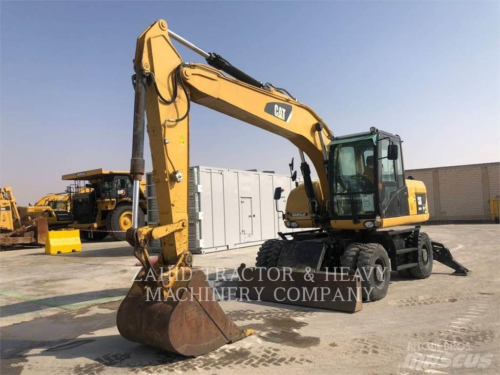 CAT M317D Gumikerekes kotrók