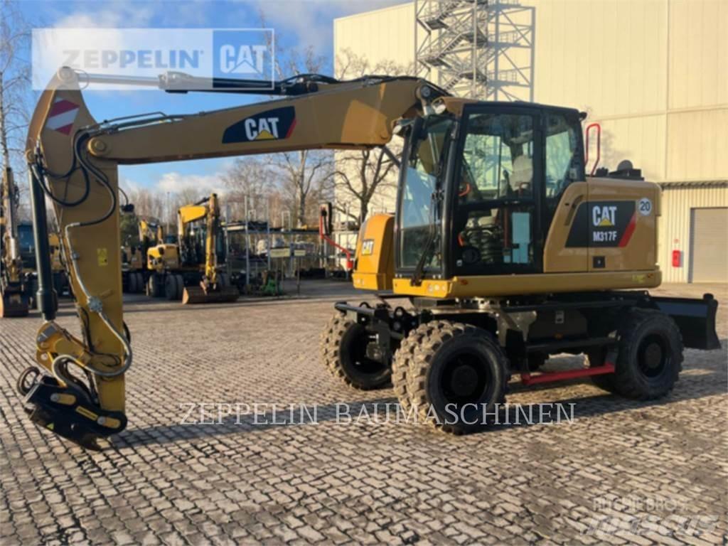CAT M317F Gumikerekes kotrók