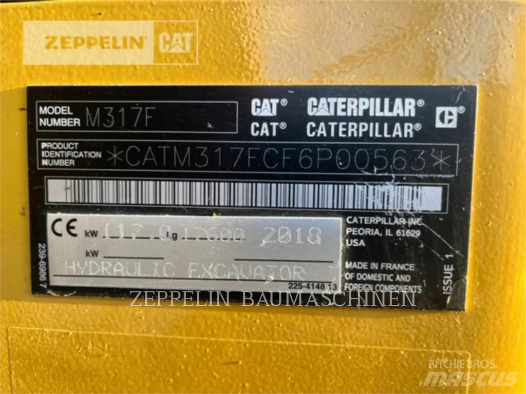 CAT M317F Gumikerekes kotrók
