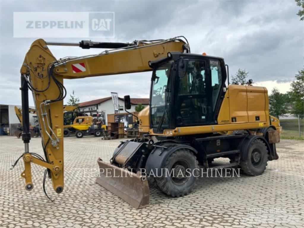 CAT M318-07A Gumikerekes kotrók