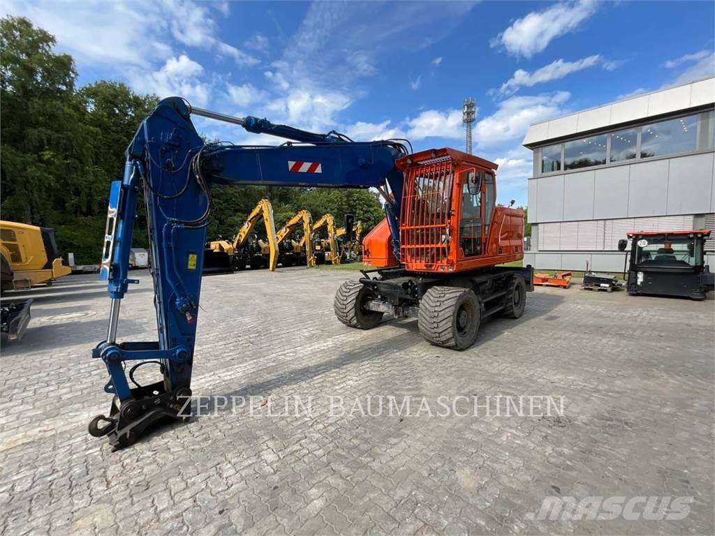 CAT M318-07A Gumikerekes kotrók