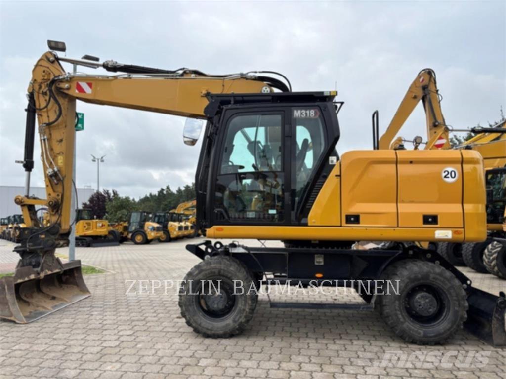 CAT M318-07A Gumikerekes kotrók