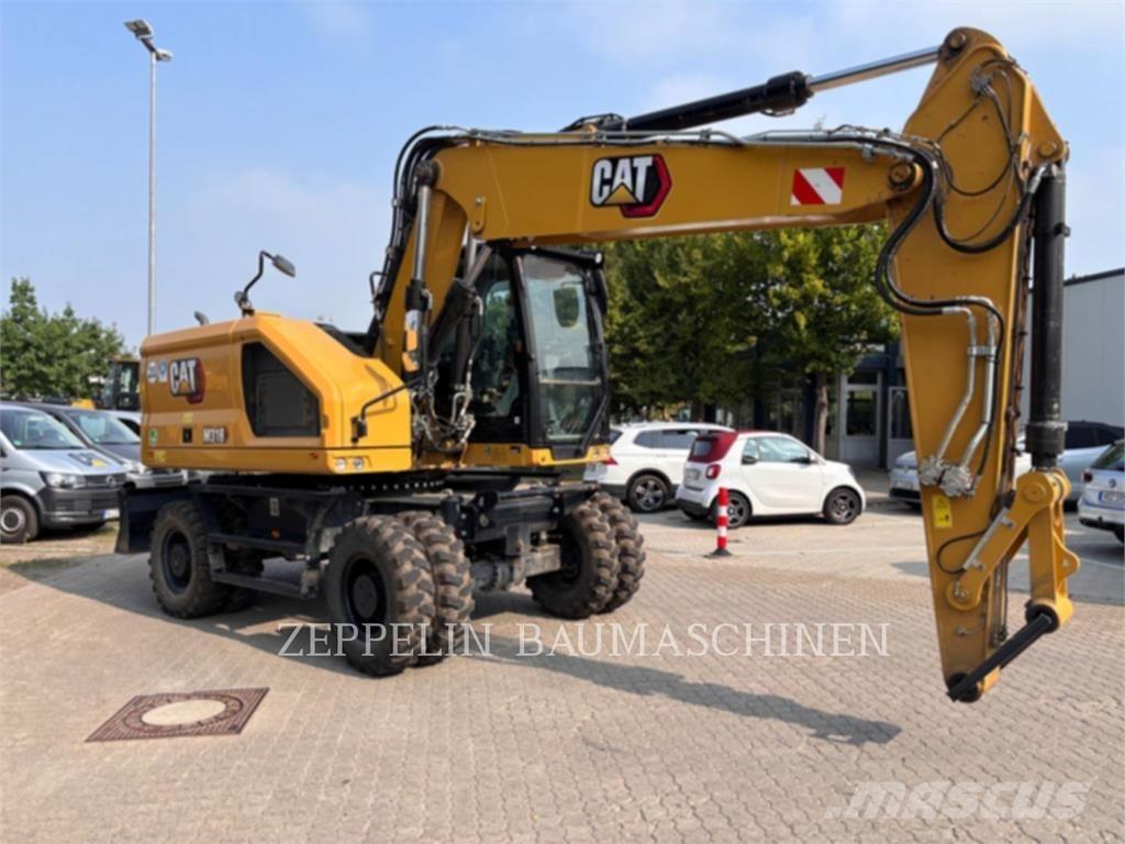 CAT M318-07A Gumikerekes kotrók