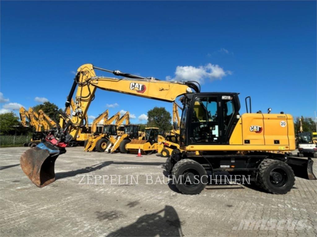 CAT M318-07A Gumikerekes kotrók