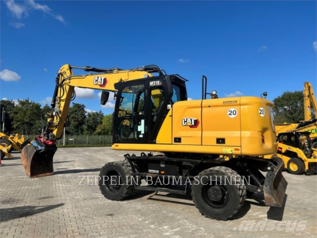 CAT M318-07A Gumikerekes kotrók