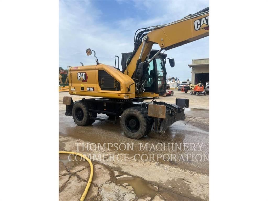 CAT M31807 Gumikerekes kotrók