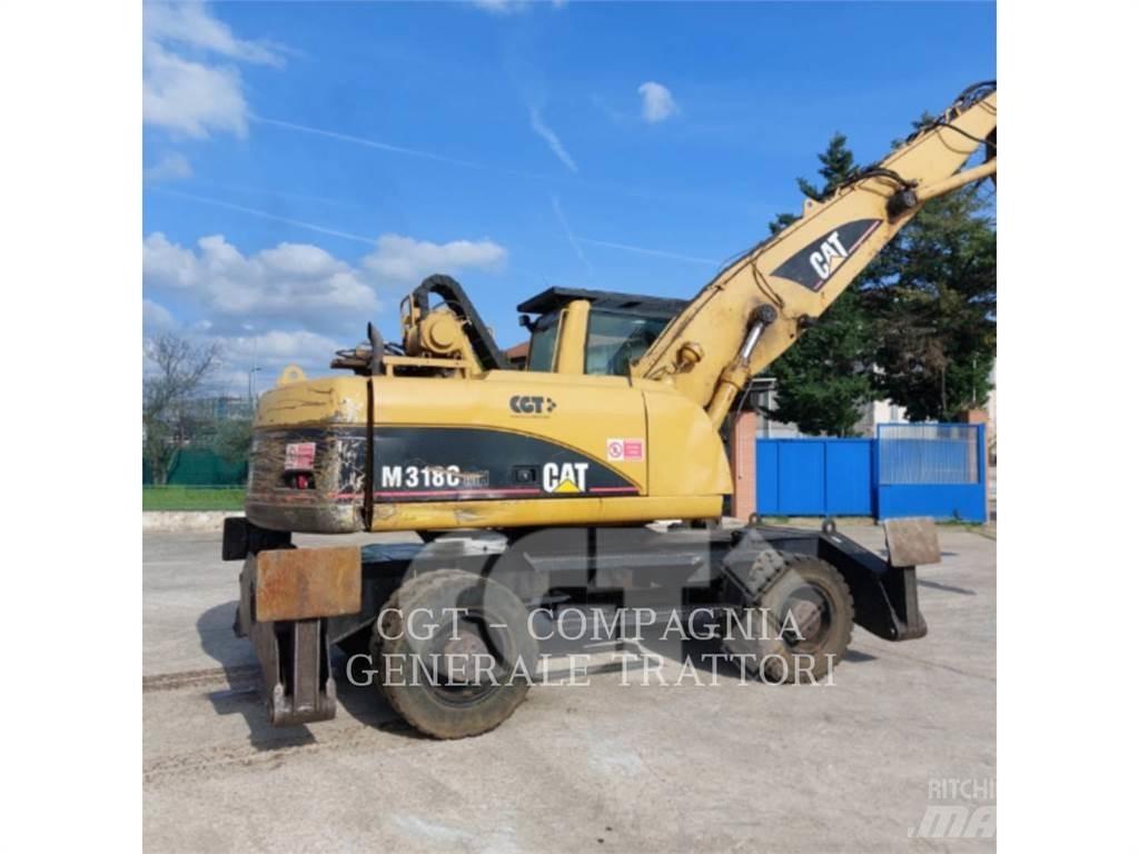 CAT M318C Gumikerekes kotrók
