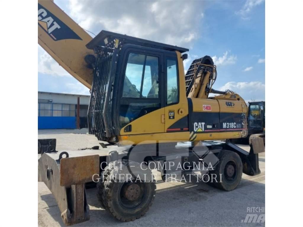 CAT M318C Gumikerekes kotrók