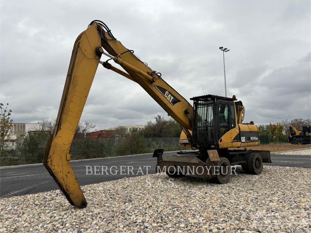 CAT M318C Gumikerekes kotrók