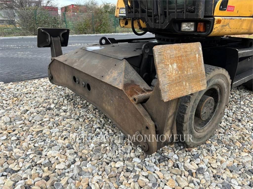 CAT M318C Gumikerekes kotrók