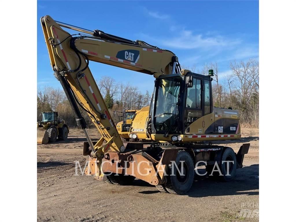 CAT M318D PM Gumikerekes kotrók