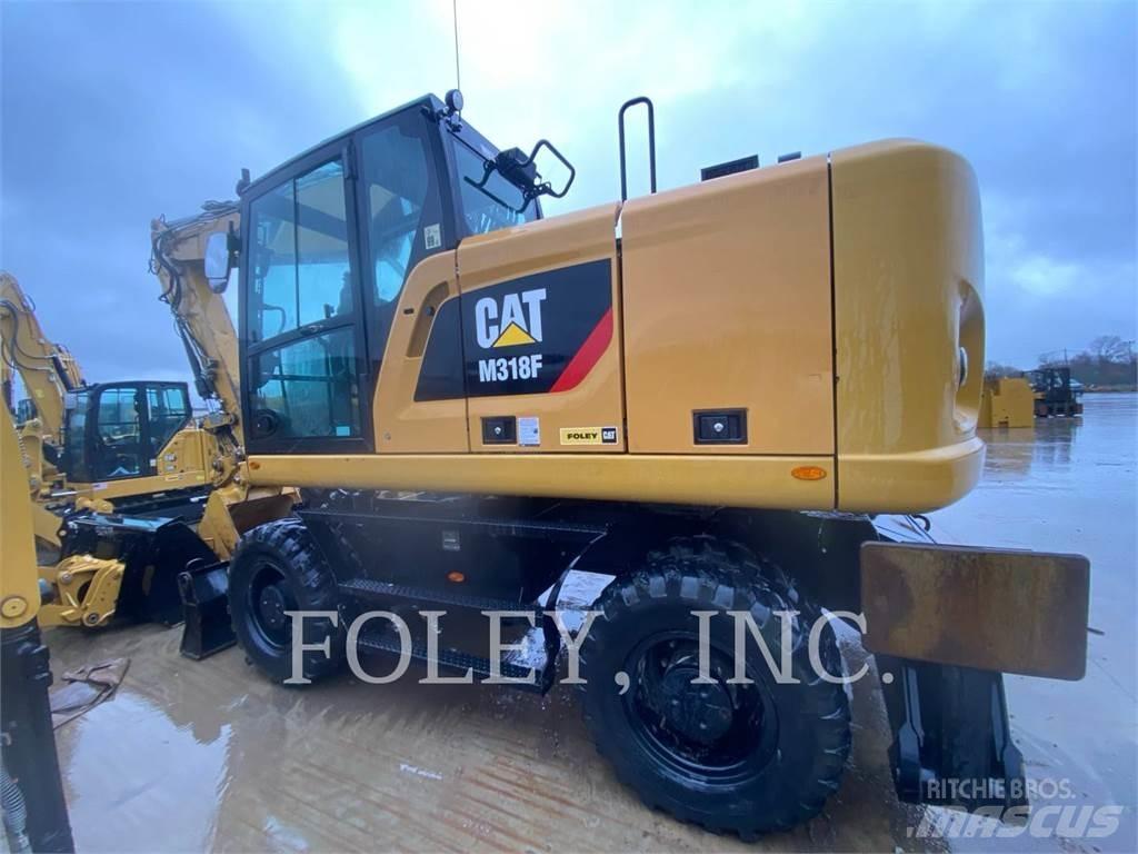 CAT M318F Gumikerekes kotrók