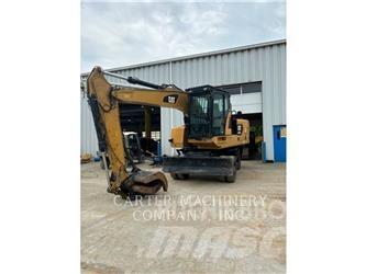 CAT M318F Gumikerekes kotrók