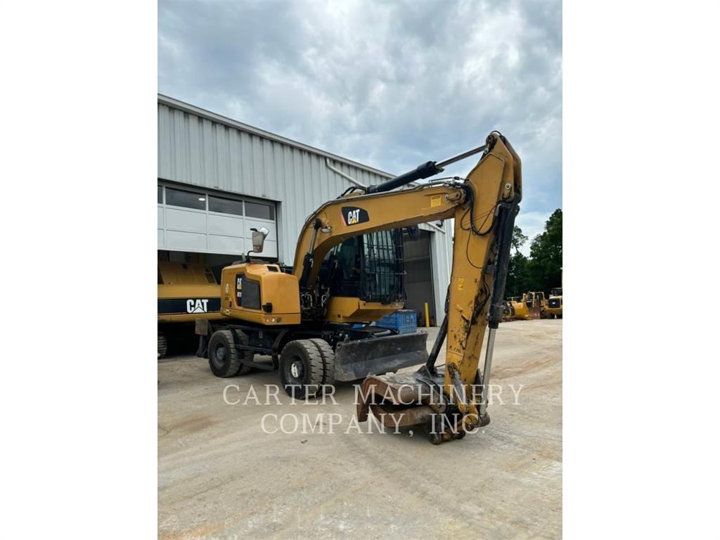 CAT M318F Gumikerekes kotrók