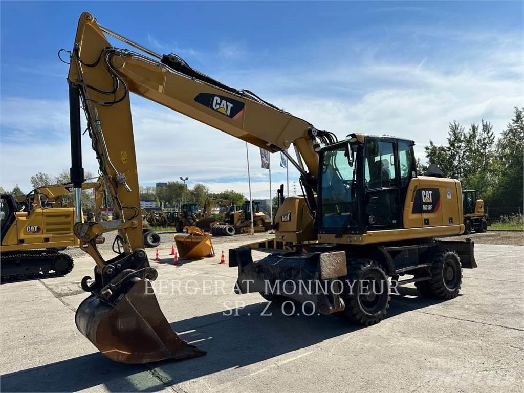 CAT M318F Gumikerekes kotrók