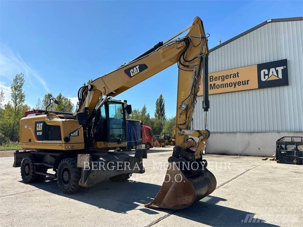 CAT M318F Gumikerekes kotrók