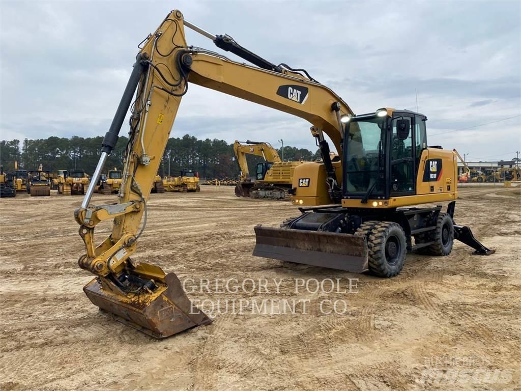 CAT M318F Gumikerekes kotrók