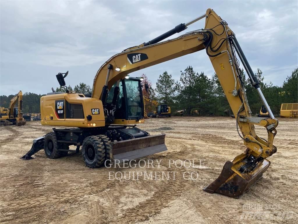 CAT M318F Gumikerekes kotrók