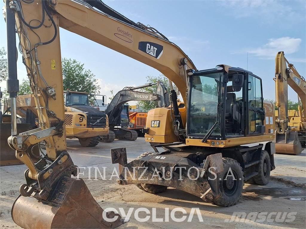 CAT M318F Gumikerekes kotrók
