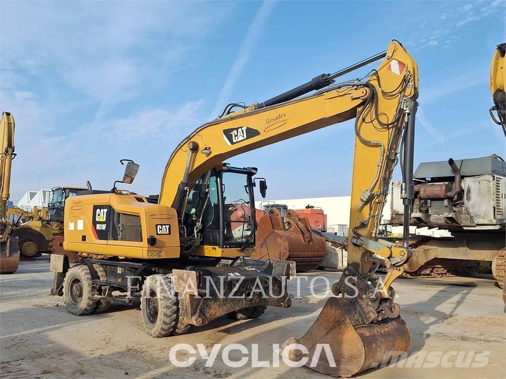 CAT M318F Gumikerekes kotrók