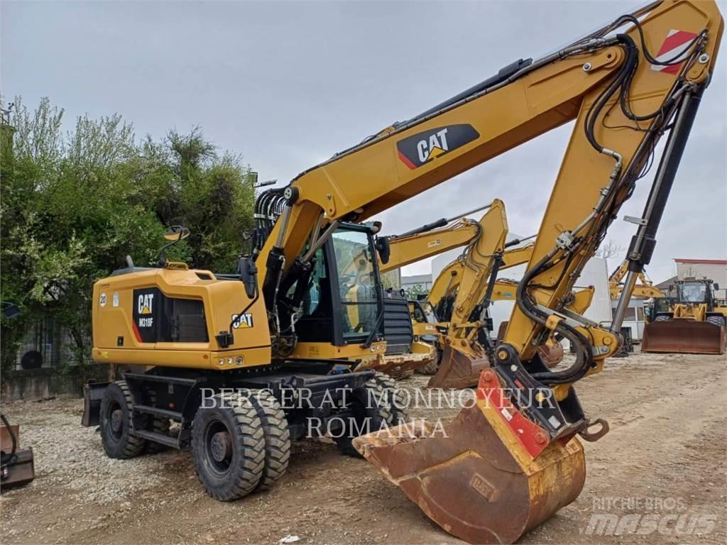 CAT M318F Gumikerekes kotrók