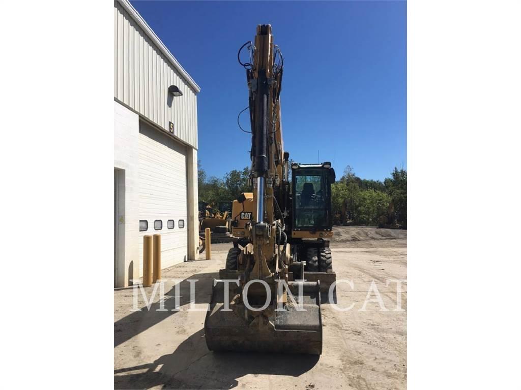 CAT M318F Gumikerekes kotrók
