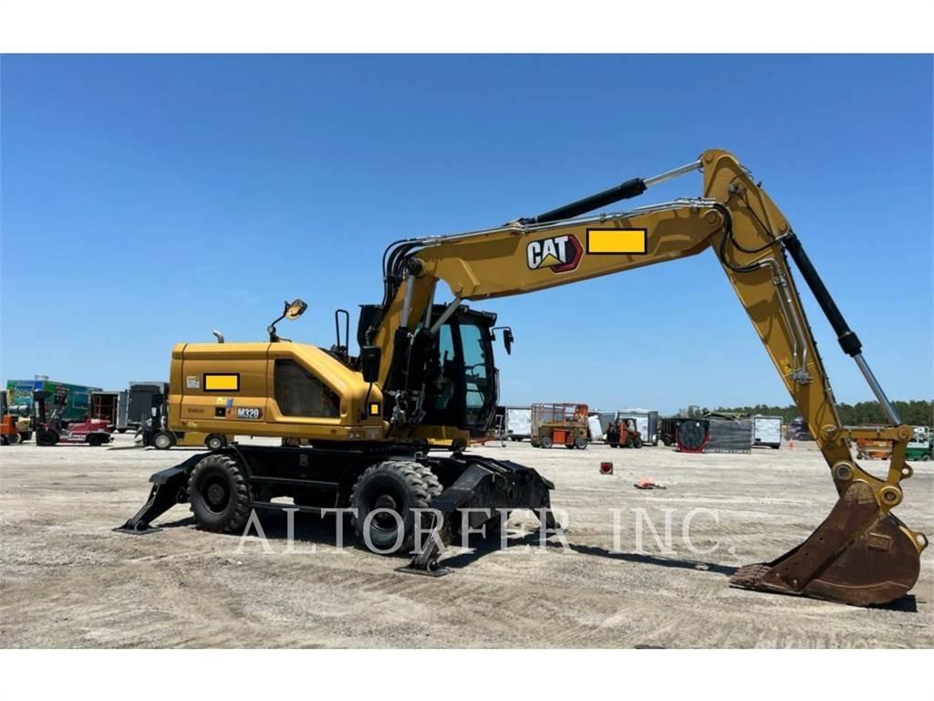 CAT M320 Gumikerekes kotrók