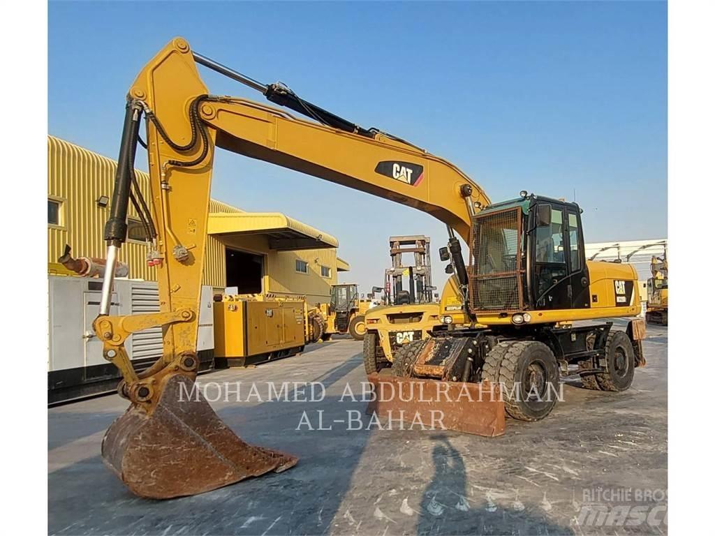 CAT M320D2 Gumikerekes kotrók