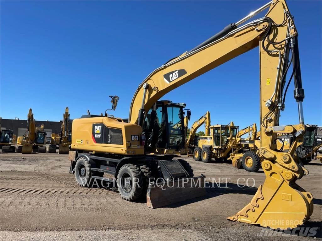 CAT M320F Gumikerekes kotrók