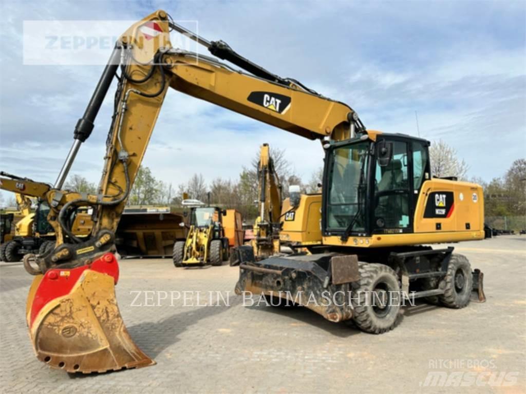 CAT M320F Gumikerekes kotrók