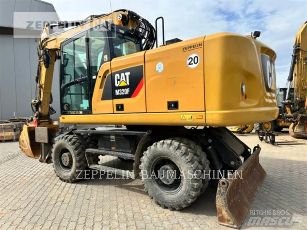 CAT M320F Gumikerekes kotrók