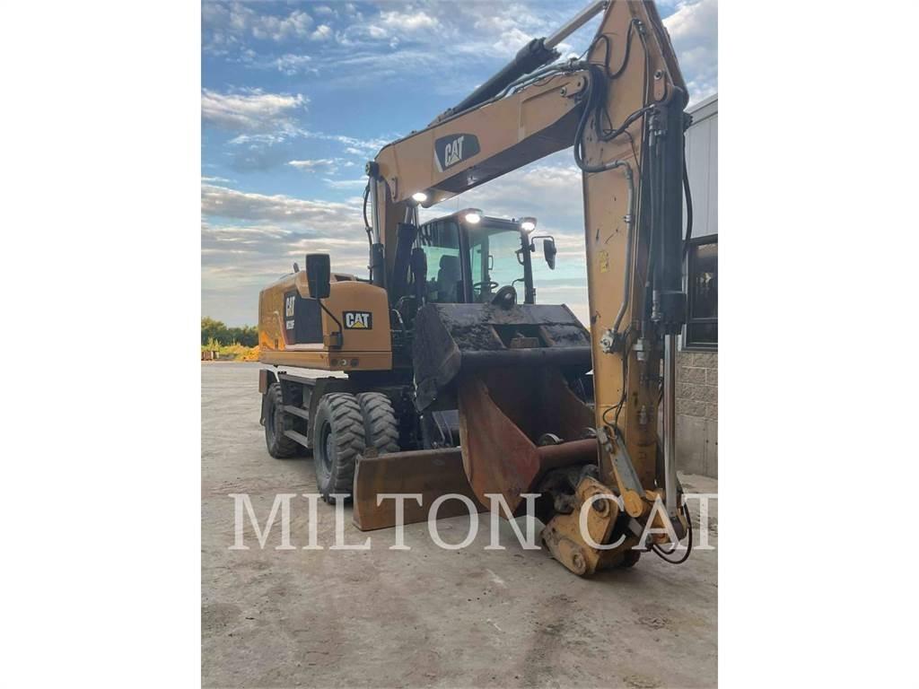 CAT M320F Gumikerekes kotrók