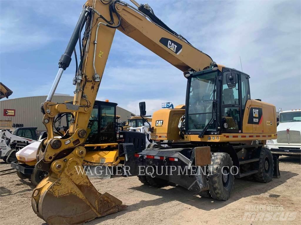 CAT M320F Gumikerekes kotrók