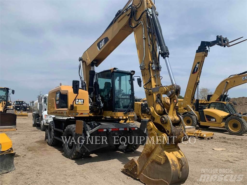 CAT M320F Gumikerekes kotrók