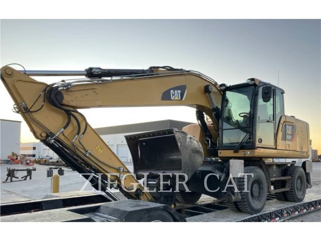 CAT M320F Gumikerekes kotrók