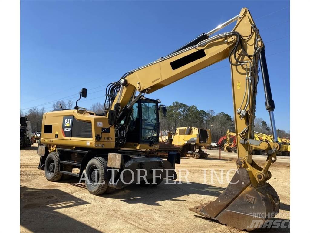 CAT M320F Gumikerekes kotrók