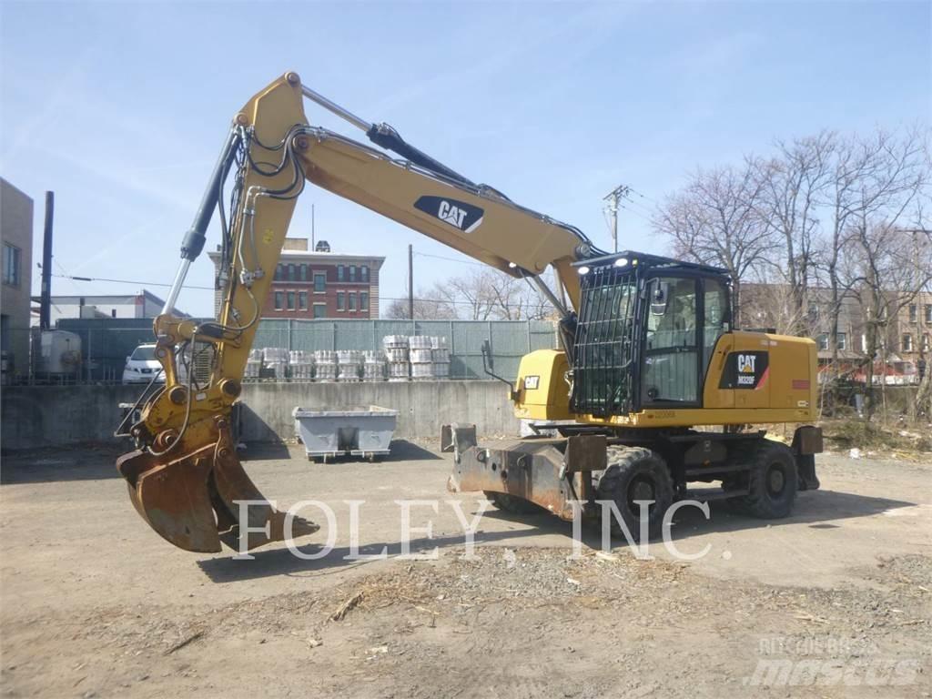CAT M320F Gumikerekes kotrók