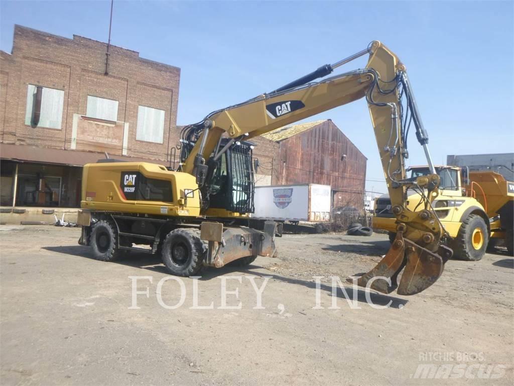 CAT M320F Gumikerekes kotrók