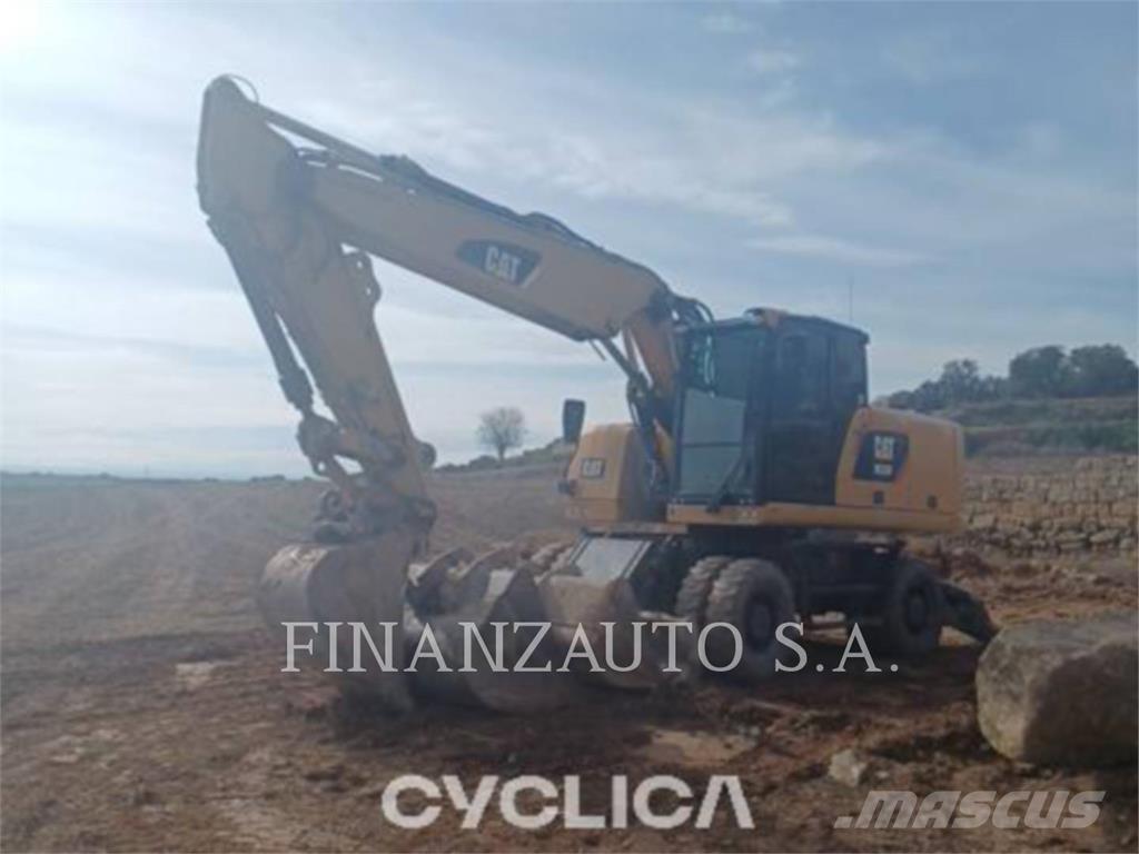 CAT M320F Gumikerekes kotrók